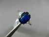 3.07CT TRILLION DIAMOND & OVAL SAPPHIRE 18KT WHITE GOLD 3 STONE ENGAGEMENT RING