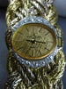 ESTATE LARGE & LONG BAUME & MERCIER .88CT DIAMOND 18K TWO TONE GOLD WOVEN WATCH