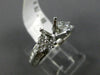 ESTATE .92CT DIAMOND ROUND & BAGUETTE 18KT WHITE GOLD SEMI MOUNT ENGAGMENT RING
