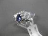 ESTATE .90CT DIAMOND & AAA TANZANITE 14KT WHITE GOLD CLUSTER COCKTAIL RING