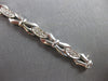 .59CT DIAMOND 14KT WHITE GOLD 3D ROUND 3 STONE XO FILIGREE LOVE TENNIS BRACELET