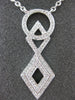 ESTATE .29CT DIAMOND 18KT WHITE GOLD CIRCLE OF LIFE INFINITY LOVE KNOT NECKLACE
