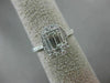 ESTATE LARGE .69CT ROUND & BAGUETTE DIAMOND 18KT WHITE GOLD OVAL ENGAGMENT RING