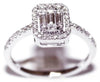 ESTATE .50CT DIAMOND 18KT WHITE GOLD ROUND & BAGUETTE INVISIBLE FRIENDSHIP RING
