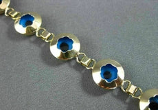 ESTATE 14KT YELLOW GOLD & ROUND BLUE CRYSTAL FLORAL EVIL EYE BRACELET #22954