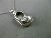 ESTATE .03 DIAMOND 14KT WHITE GOLD HANDCRAFTED BOW BABY GIRL SHOE PENDANT #21949