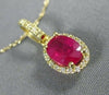ESTATE 1.02CT DIAMOND & AAA OVAL RUBY 14KT YELLOW GOLD 3D HALO FLOATING PENDANT