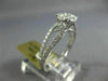 ESTATE .66CT DIAMOND 14KT WHITE GOLD 3D CLASSIC INVISIBLE ROUND ENGAGEMENT RING