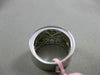 ESTATE WIDE .52CT WHITE & FANCY YELLOW DIAMOND 18KT WHITE GOLD FLOWER LOVE RING
