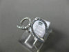 ESTATE WIDE .23CT DIAMOND 18KT WHITE GOLD DOUBLE TEAR DROP CRISS CROSS FUN RING