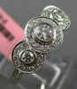 ESTATE .92CT DIAMOND 18KT WHITE GOLD 3 STONE PAST PRESENT FUTURE HALO BEZEL RING