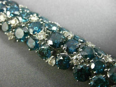 ESTATE EXTRA LARGE 56.98CT WHITE & BLUE DIAMOND 18KT WHITE GOLD TENNIS BRACELET