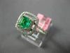 ESTATE .74CT DIAMOND & AAA EMERALD 18KT 2 TONE GOLD DOUBLE HALO ENGAGEMENT RING