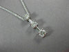 ESTATE LARGE .66CT ROUND DIAMOND 14KT WHITE GOLD 3 STONE FLOATING PENDANT #16660