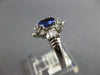 1.12CT DIAMOND & AAA TANZANITE 14K WHITE GOLD 3D OVAL & BAGUETTE ENGAGEMENT RING