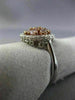 WIDE .97CT WHITE & PINK DIAMOND 18KT WHITE & ROSE GOLD CLUSTER HALO FLOWER RING