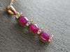 ESTATE .88CT DIAMOND & AAA RUBY 14KT ROSE GOLD 3D PAST PRESENT FUTURE PENDANT