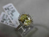 ESTATE 1.32CT GIA FANCY YELLOW DIAMOND 18KT WHITE GOLD OVAL HALO ENGAGEMENT RING