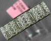 ESTATE .60CT DIAMOND 18KT WHITE GOLD ROUND & PRINCESS INVISIBLE ANNIVERSARY RING
