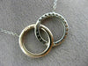 ESTATE .38CT DIAMOND 14KT WHITE & ROSE GOLD 3D CLASSIC CIRCLE LOVE KNOT NECKLACE