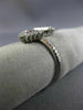 ESTATE WIDE .36CT DIAMOND & AAA RUBY 14KT WHITE GOLD TRIANGLE PAVE FLEXIBLE RING