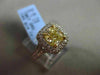 ESTATE 1.89CT GIA FANCY YELLOW DIAMOND 18KT WHITE GOLD HALO ENGAGEMENT RING