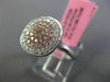 ESTATE WIDE .61CT WHITE & PINK DIAMOND 18KT WHITE & ROSE GOLD ROUND CLUSTER RING