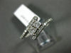 ESTATE .56CT DIAMOND 14KT WHITE GOLD 2 STONE CRISS CROSS SEMI ETERNITY LOVE RING