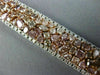 WIDE 22.84CT WHITE & PINK DIAMOND 18KT WHITE & ROSE GOLD CLUSTER TENNIS BRACELET