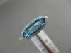 ESTATE 1.56CT DIAMOND & AAA OVAL BLUE TOPAZ 14KT WHITE GOLD HALO FILIGREE RING