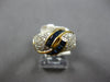 1.20CT DIAMOND & AAA SAPPHIRE 18KT YELLOW GOLD ROUND & BAGUETTE CRISS CROSS RING