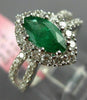 ESTATE 1.53CT DIAMOND & AAA EMERALD 18KT WHITE GOLD CLASSIC HALO ENGAGEMENT RING