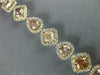 ESTATE 8.84CT WHITE & PINK DIAMOND 18KT WHITE & ROSE GOLD HALO TENNIS BRACELET