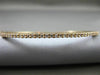 ESTATE .50CT DIAMOND 14KT ROSE GOLD 3D 2mm CLASSIC SHARE PRONG BANGLE BRACELET