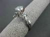 ESTATE 1.12CT ROUND & BAGUETTE DIAMOND 14KT WHITE GOLD SOLITAIRE ENGAGEMENT RING