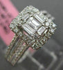 ESTATE LARGE .66CT ROUND & BAGUETTE DIAMOND 18KT WHITE GOLD HALO ENGAGEMENT RING