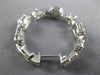 3.69CT DIAMOND 18KT WHITE GOLD ROUND & BAGUETTE INSIDE OUT HOOP HANGING EARRINGS
