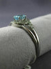 ESTATE .48CT DIAMOND & AAA OVAL CUT AQUAMARINE 14KT WHITE GOLD 3D LOVE KNOT RING