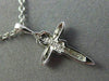 ESTATE SMALL .12CT DIAMOND 14KT WHITE GOLD 3D CROSS INFINITY FLOATING PENDANT