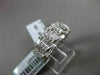 ESTATE WIDE 1.24CT BAGUETTE & ROUND DIAMOND 18KT WHITE GOLD ANNIVERSARY RING