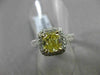 ESTATE 2.26CTW GIA FANCY YELLOW DIAMOND 18KT WHITE GOLD HALO ENGAGEMENT RING