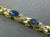 ESTATE 1.21CT DIAMOND & AAA MARQUISE SAPPHIRE 14KT TWO TONE GOLD X LOVE BRACELET