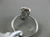 ESTATE .50CT ROUND & BAGUETTE DIAMOND 14KT WHITE GOLD FOREVER INFINITY LOVE RING
