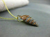 ESTATE 1.36CT YELLOW SAPPHIRE 14KT YELLOW & BLACK GOLD SEA SHELL PENDANT & CHAIN