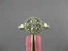 ESTATE .86CT DIAMOND 18KT WHITE GOLD 3D ROUND & PRINCESS FLOWER HALO LOVE RING