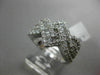 ESTATE 1.92CT BAGUETTE ROUND DIAMOND 18KT WHITE GOLD INFINITY LOVE KNOT FUN RING