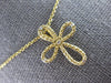 ESTATE .03CT DIAMOND 14KT YELLOW GOLD 3D CLASSIC INFINITY CROSS FLOATING PENDANT