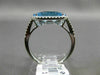 ESTATE 1.56CT DIAMOND & AAA OVAL BLUE TOPAZ 14KT WHITE GOLD HALO FILIGREE RING