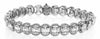 5.95CT DIAMOND 18KT WHITE GOLD ROUND & BAGUETTE CLUSTER CIRCULAR TENNIS BRACELET