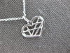 ESTATE .01CT DIAMOND 14K WHITE GOLD ROUND CRISS CROSS HEART FUN FLOATING PENDANT